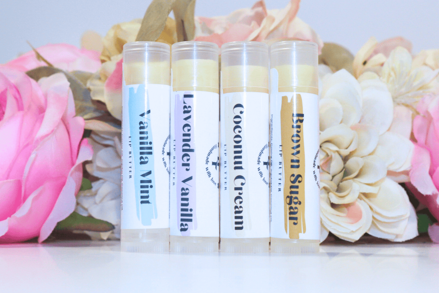 Hydrating Lip Butters in a sleek container, designed to nourish and protect lips with intense hydration and delicious flavor.