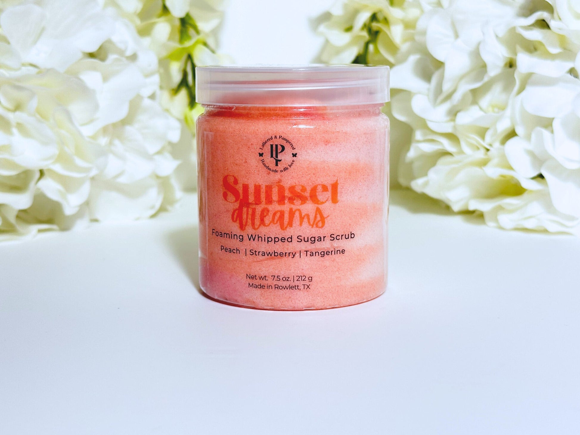 Sunset Dreams Foaming Whipped Sugar Scrub in a jar with scent notes of Peach, Strawberry and Tangerine